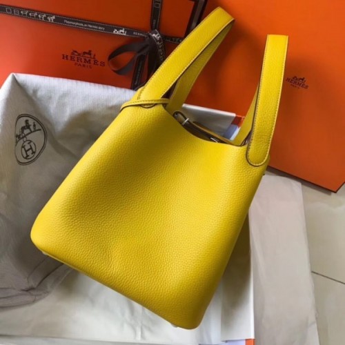 Replica Hermes Picotin LoCrafted from the Hermes's yellow taurillon  Clemence leather, this Picotin Lock 18 bag looks more like a small buckle  bag, take the handles, load it with your personal items